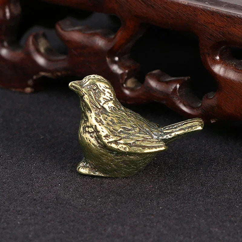 Brass Seated Songbird