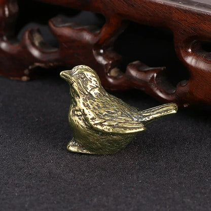 Brass Seated Songbird